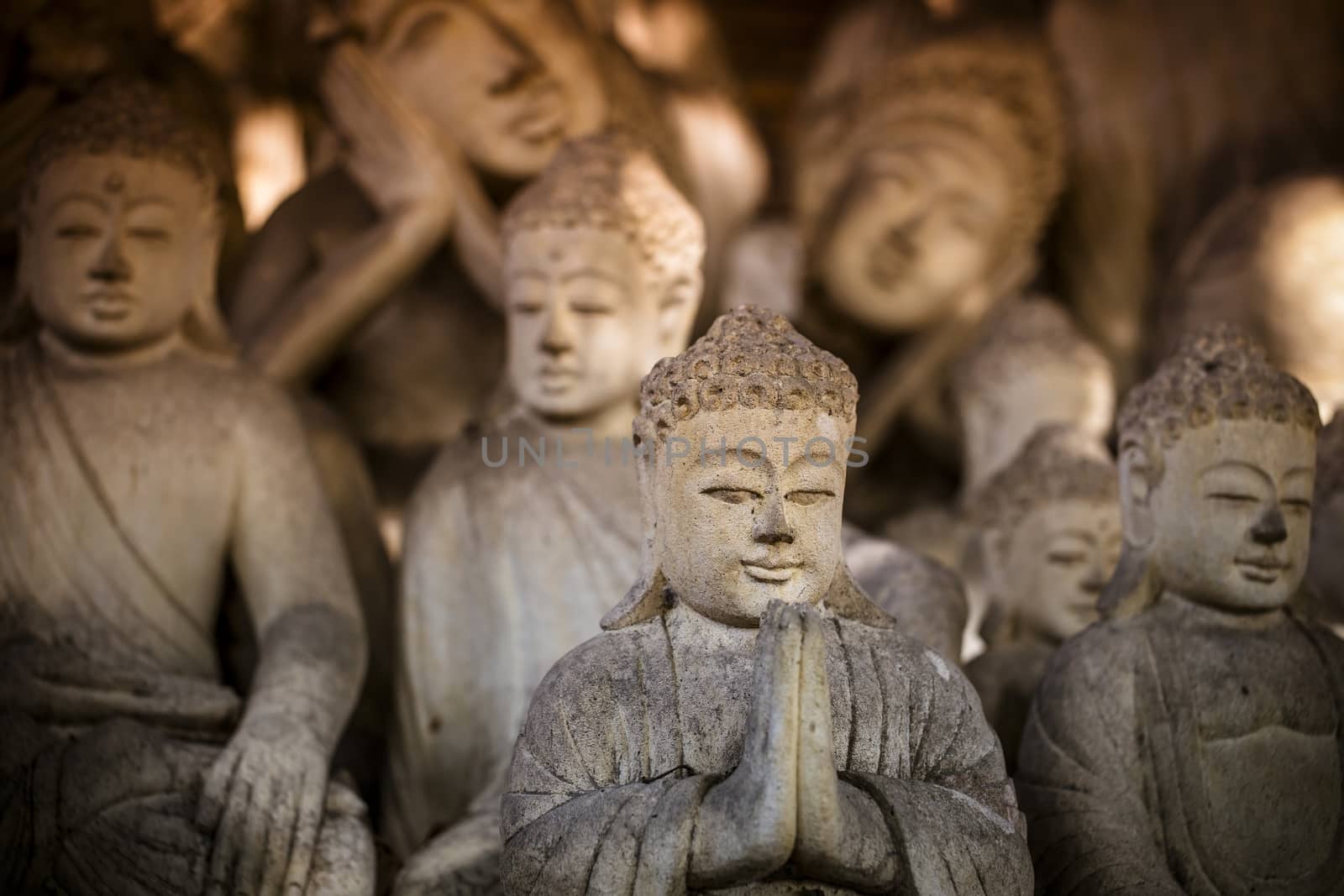 The old stone Buddha statue. Indonesia, Bali.
