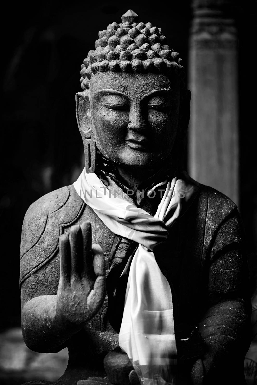 Wooden Buddha statue in black and white, kathmandu, Nepal