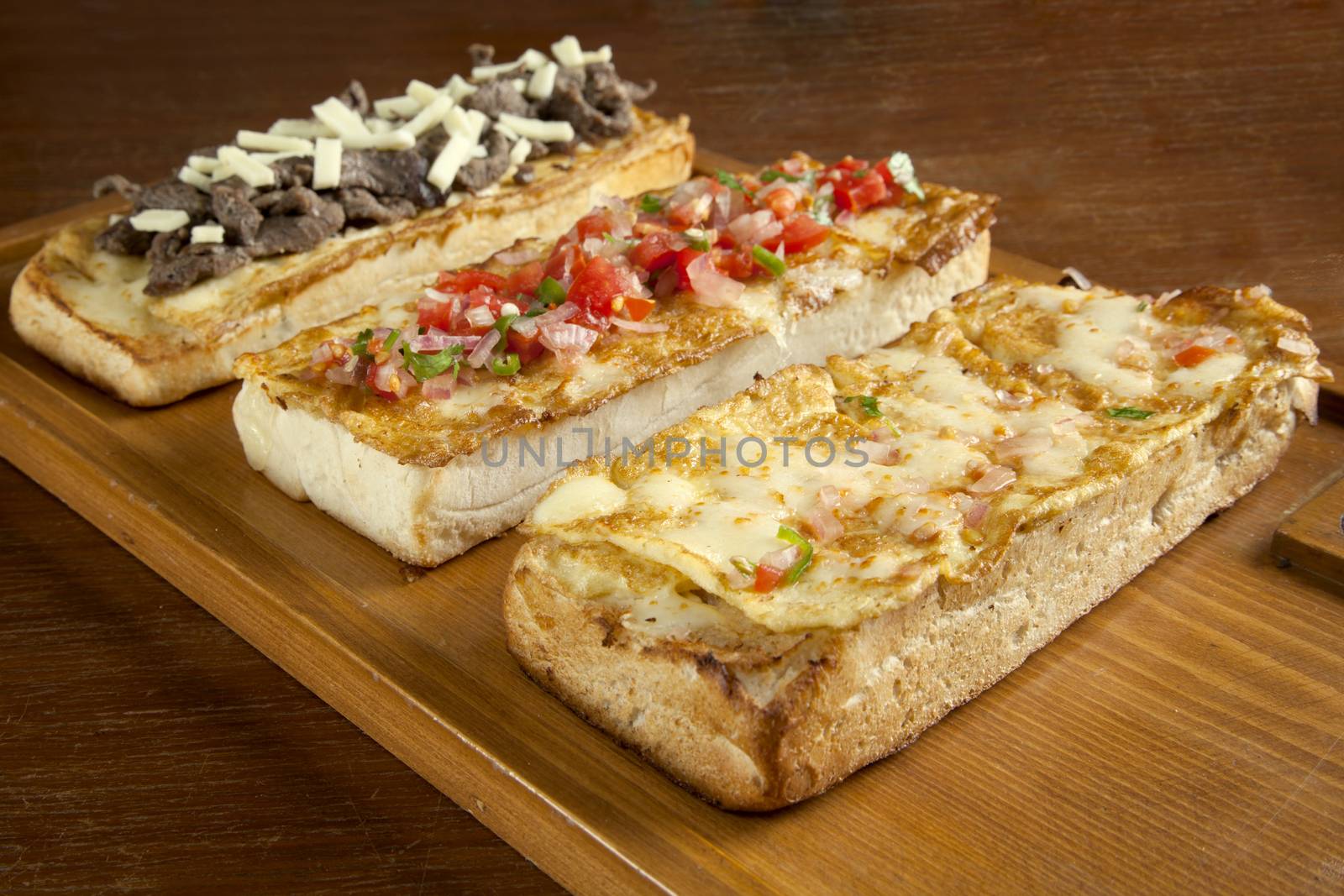 Toasted open faced omelette egg sandwich with melted mozzarella  by haiderazim