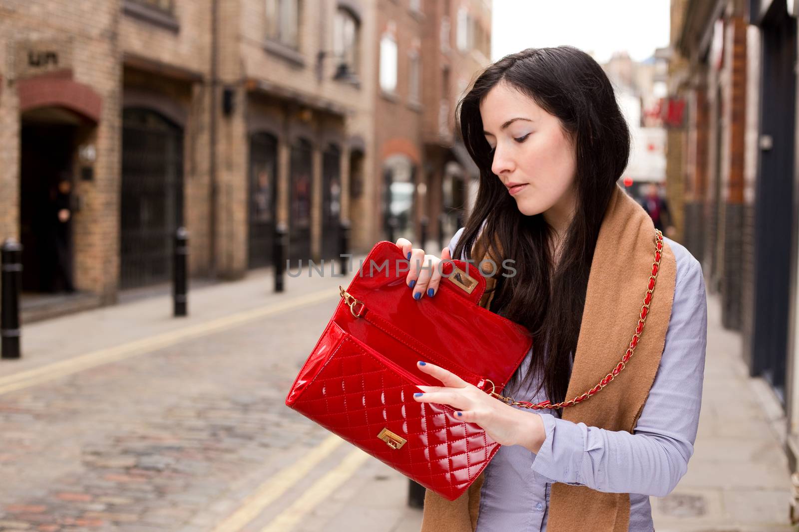 looking in handbag by michaelpuche