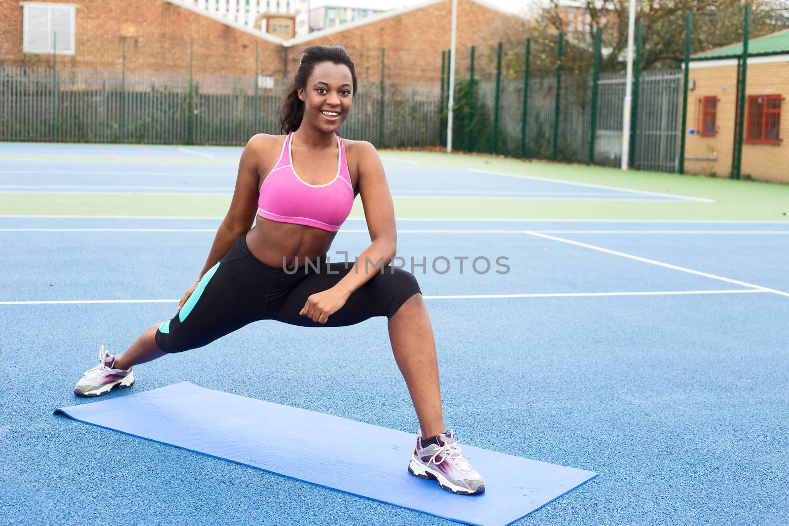 young woman stretching