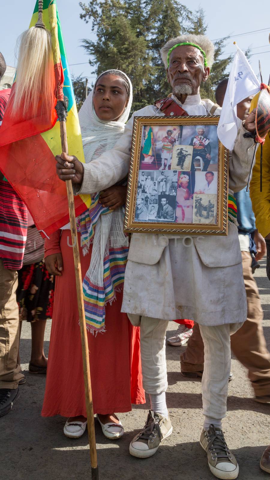 Addis Ababa - Sept 2: A war veteran carries an album with pictures depicting his decorated military past during the celebrations of the 119th Anniversary of the Ethiopian Army's victory over the invading Italian forces in the 1896 battle of Adwa. September 2, 2015, Addis Ababa, Ethiopia.