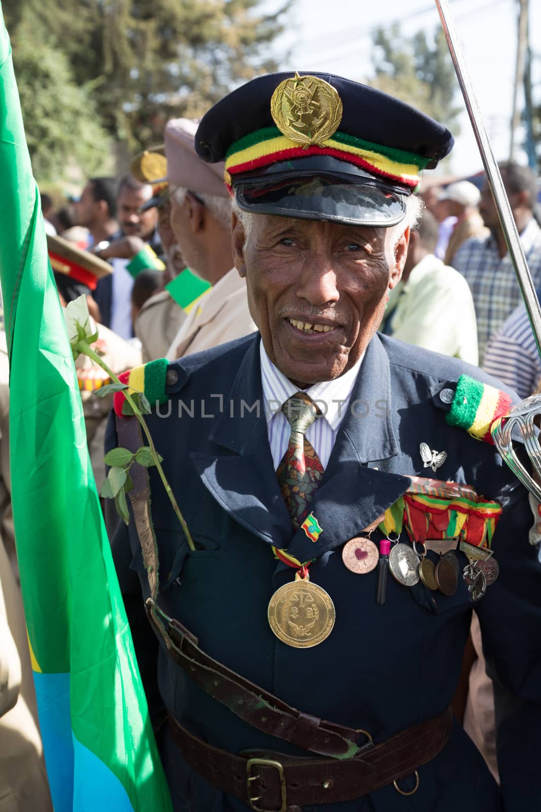 A war veteran with medals celebrates the 119th Anniversary of Ad by derejeb