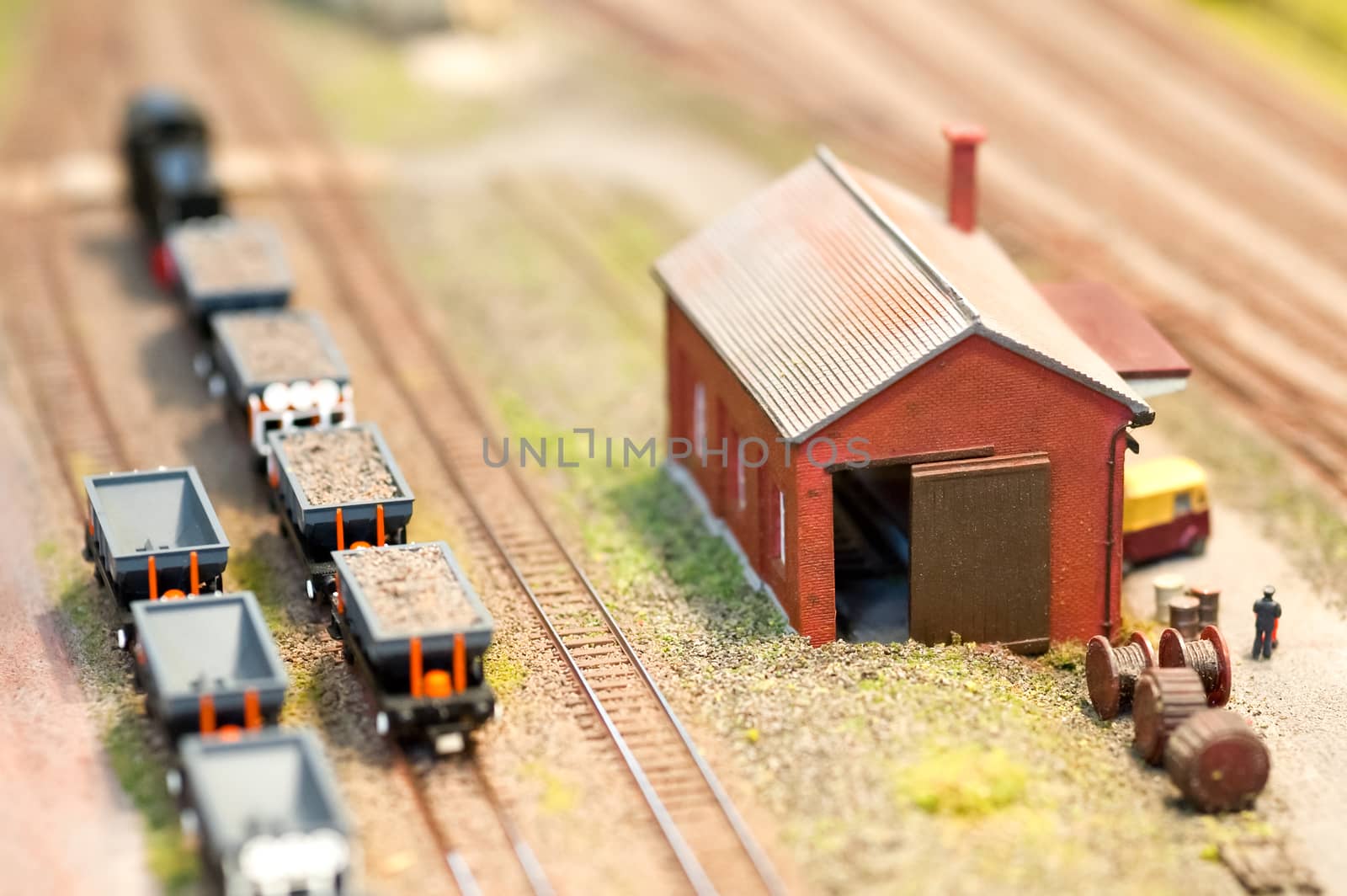 building and freight wagons on a miniature train set - shallow d.o.f