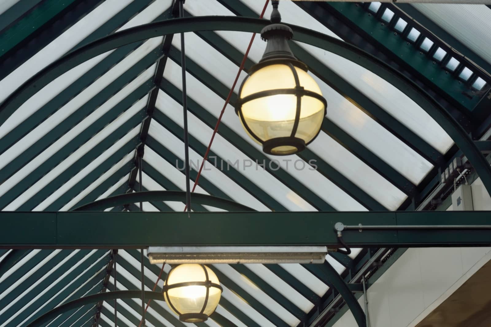 Inside of black and white roof with lamps