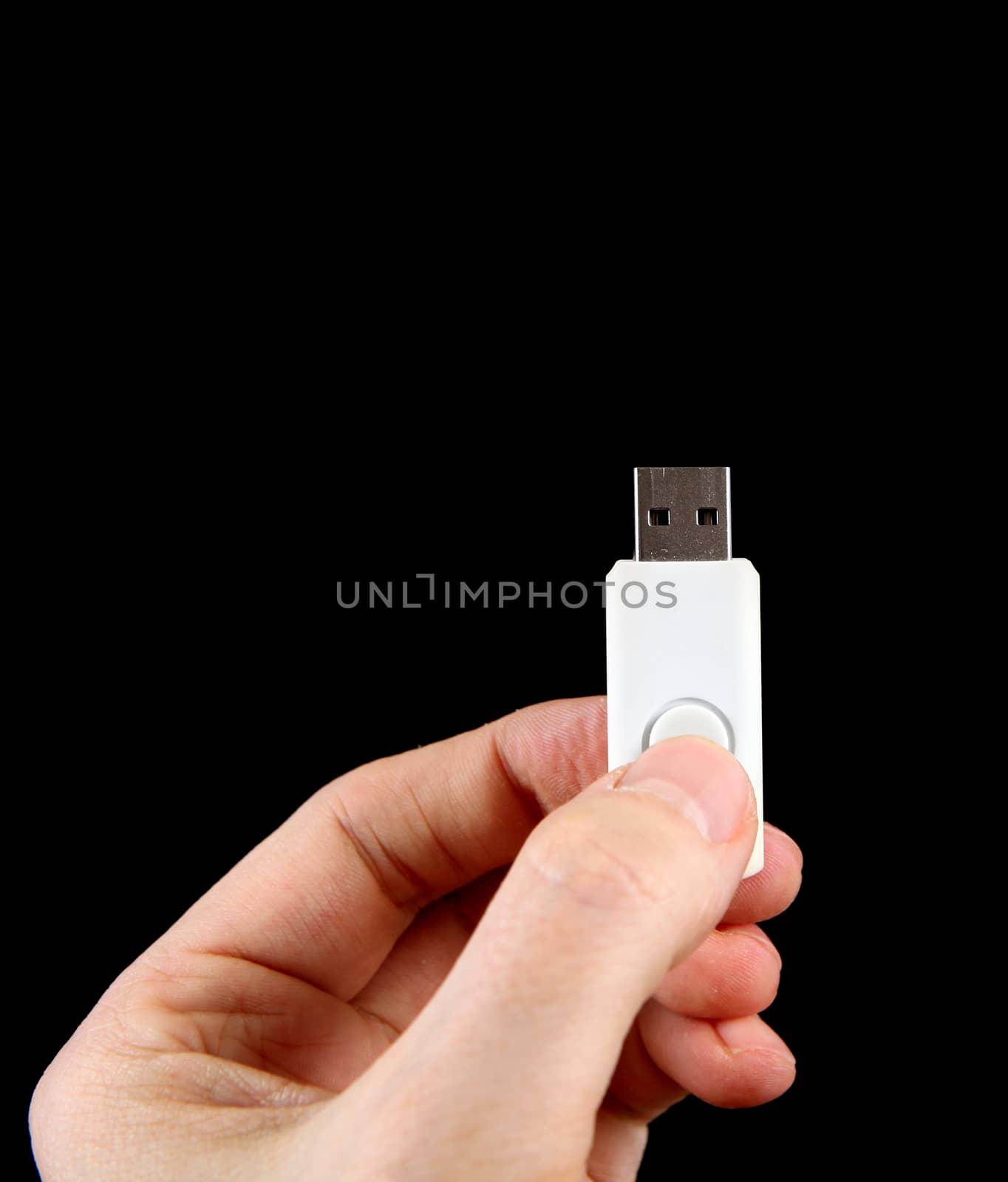 USB Drive in the Hand by sabphoto