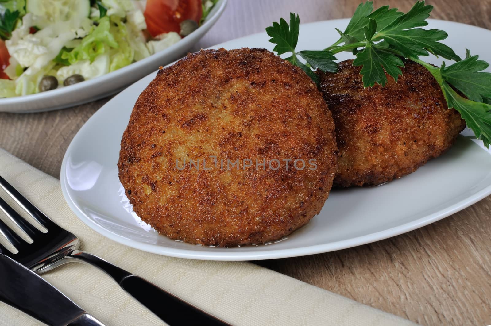 Chicken cutlets in bread crumbs on the dining table