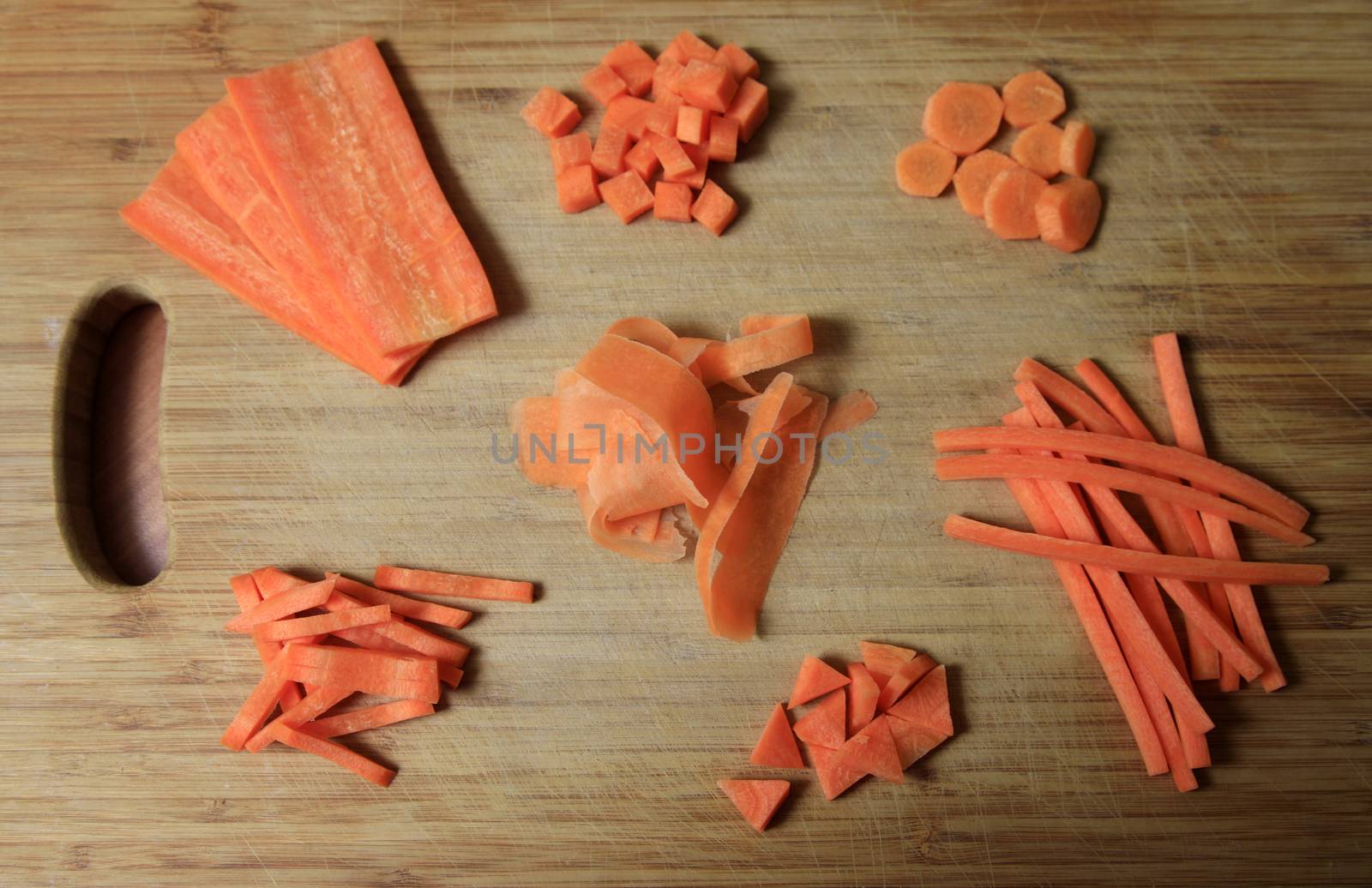Sliced carrots on a wooden board