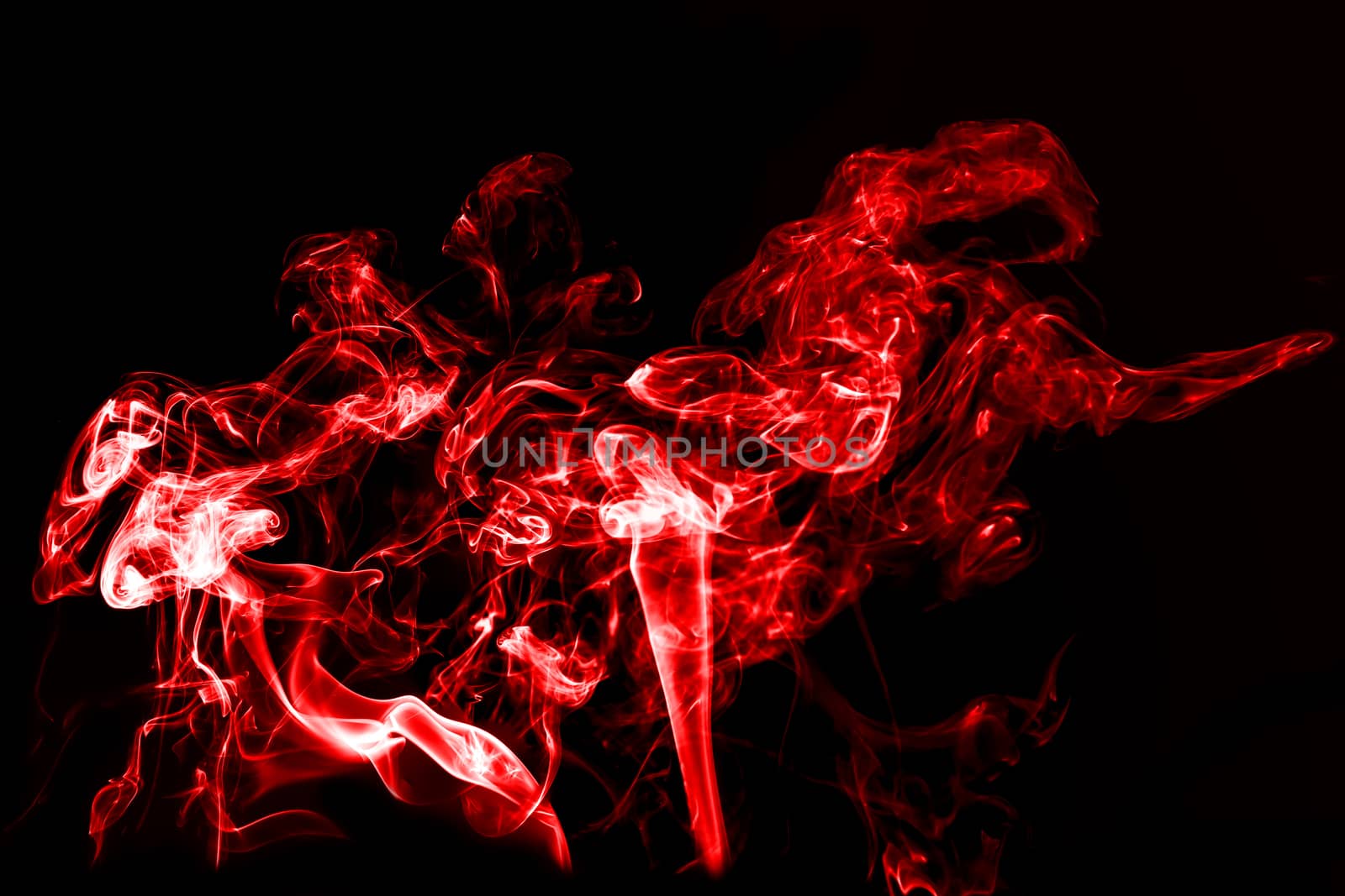 red smoke with light on black background