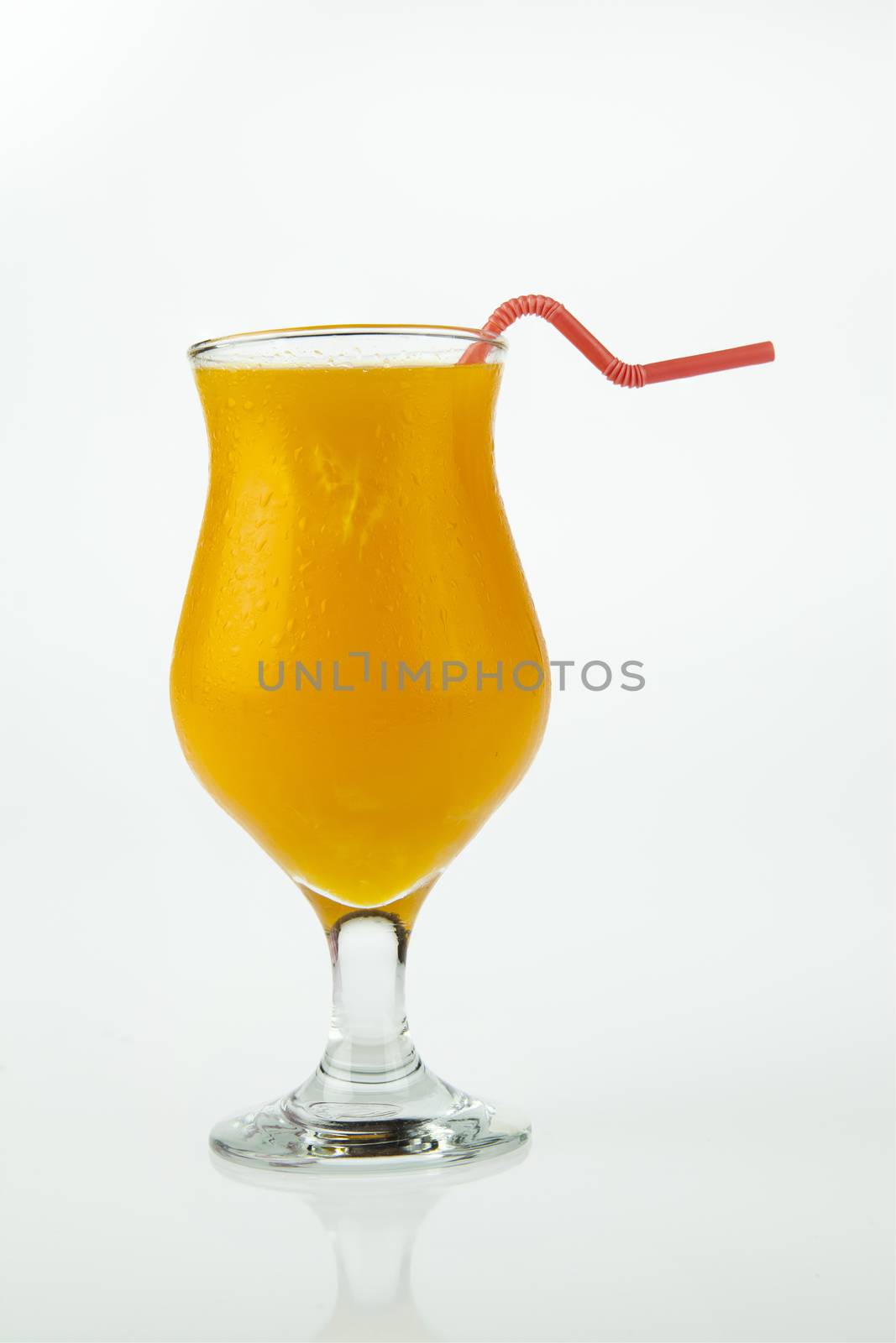 glasses of orange juice by Chattranusorn09