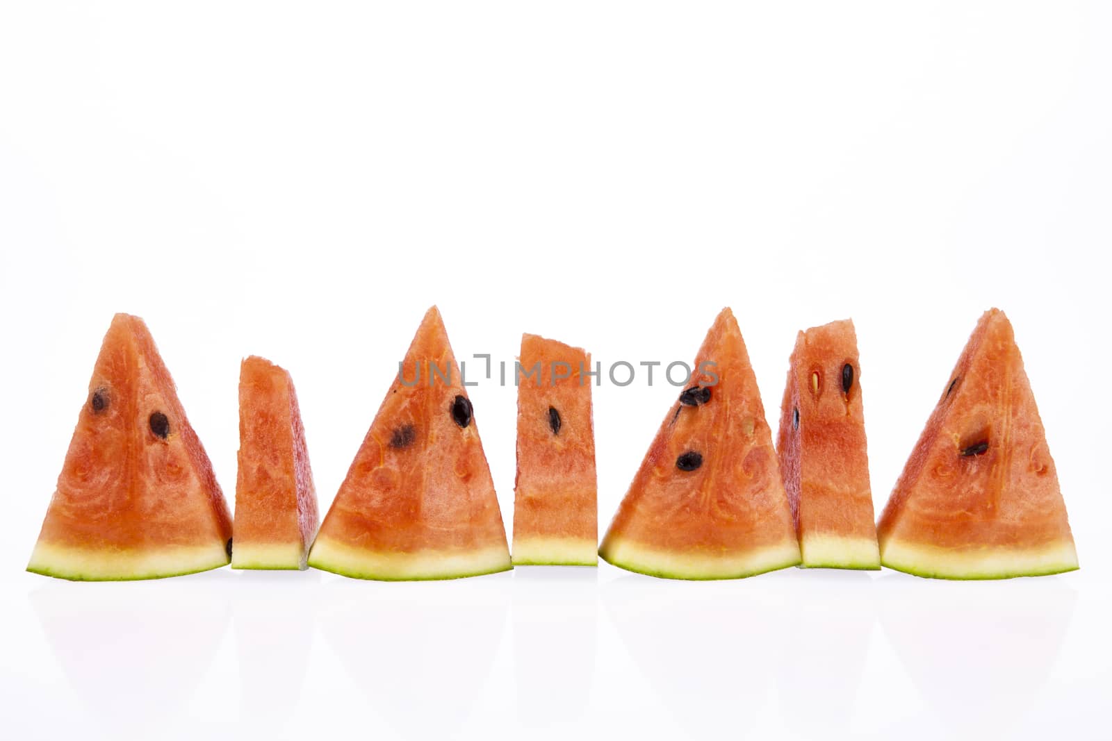 Typical and delicious slice of watermelon with whole watermelon