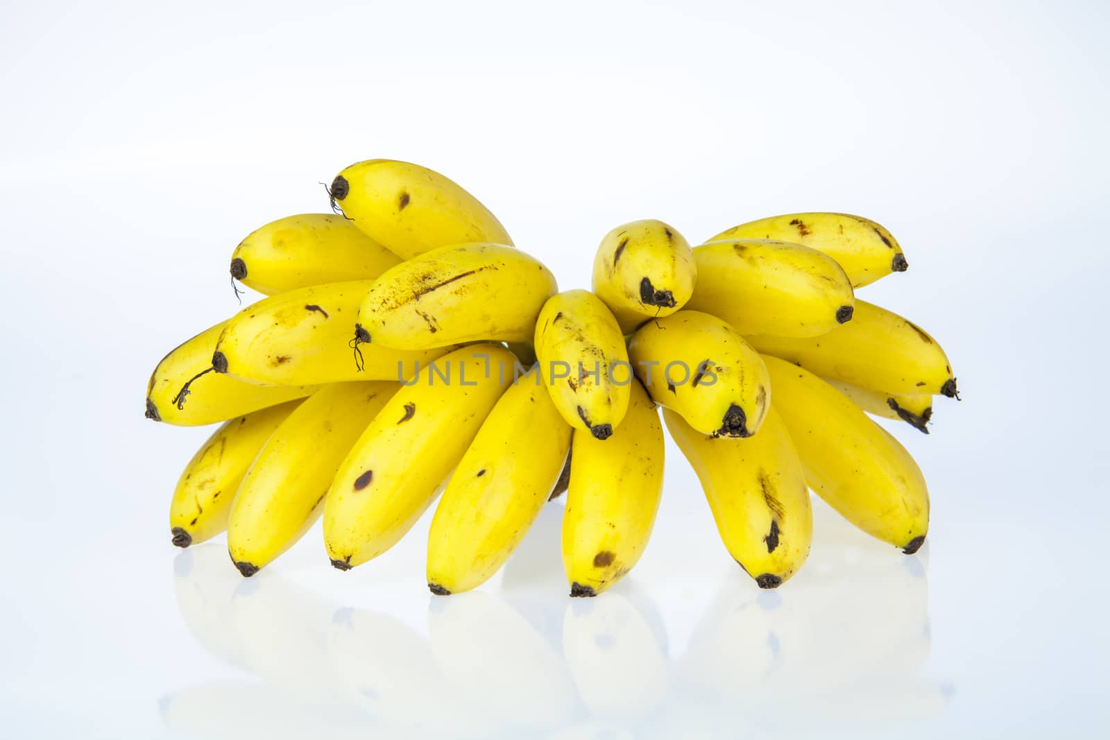 bunch of ripe bananas isolated on white background