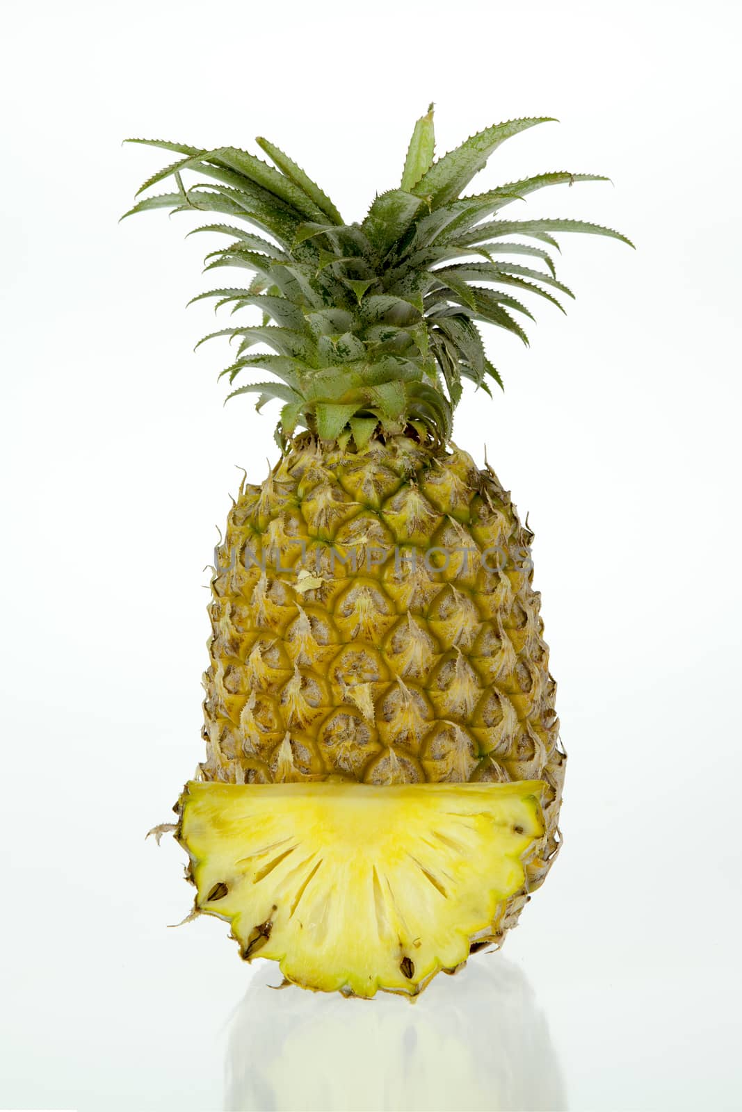 Pineapple on white background, very sweet, it came from the north of Thailand.