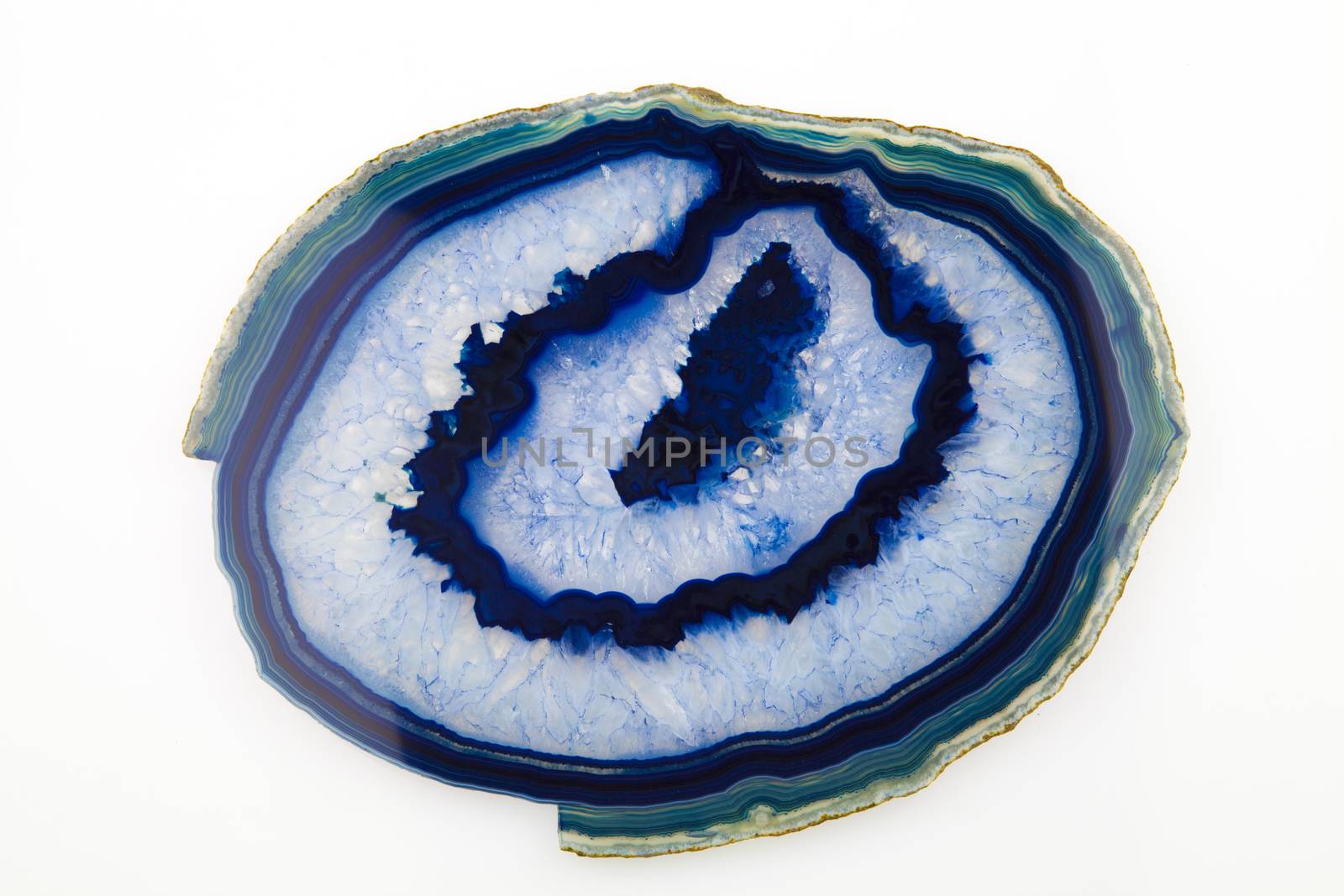 A slice of blue agate crystal on white background