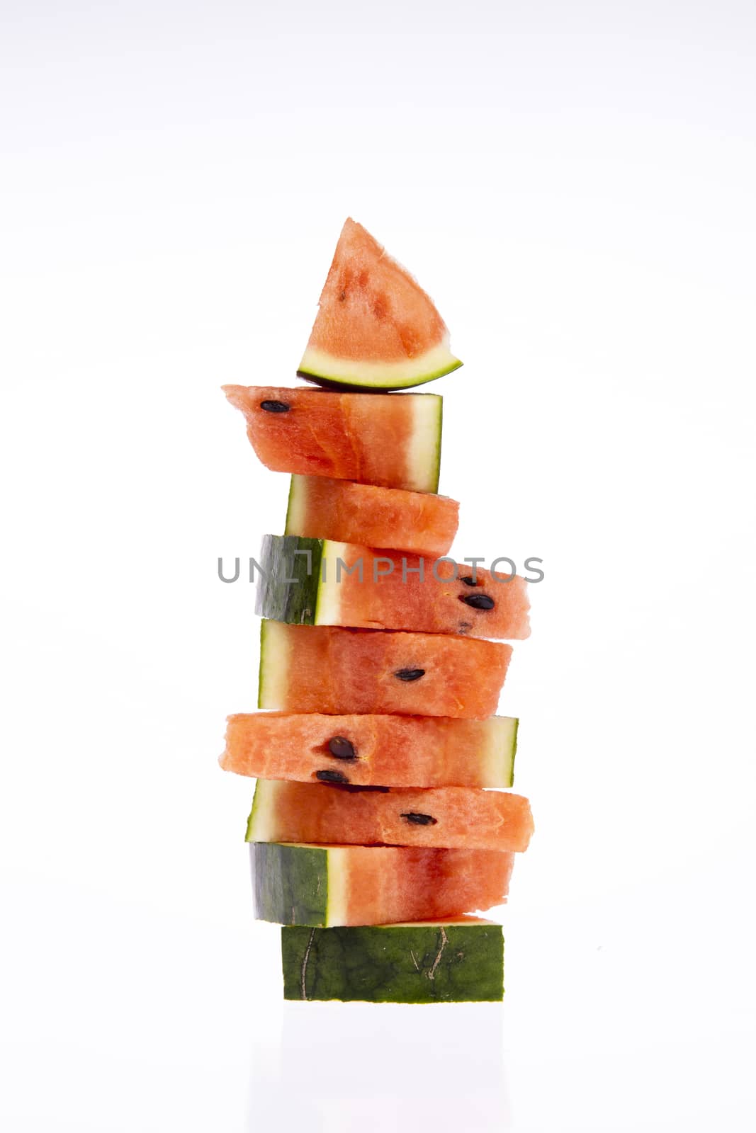 Typical and delicious slice of watermelon with whole watermelon