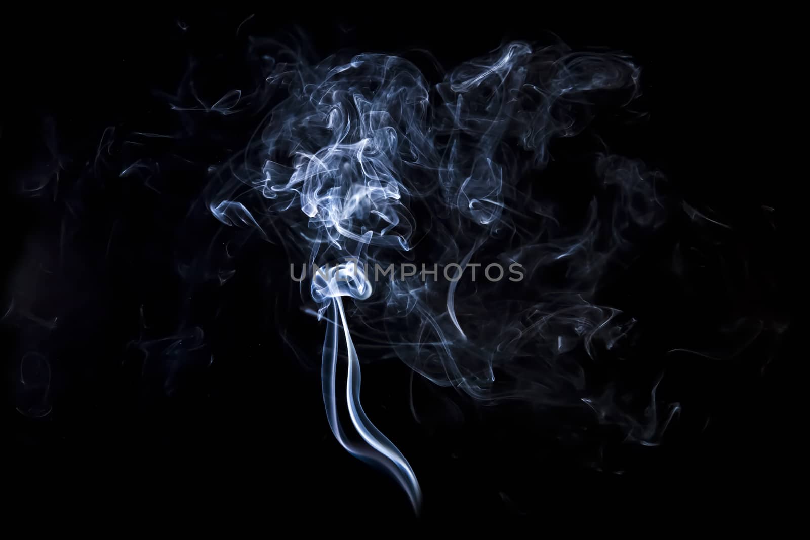 Gray smoke with light on back background