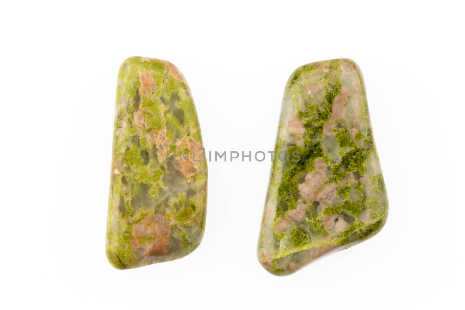 Unakite natural is multi-color gemstone on white background