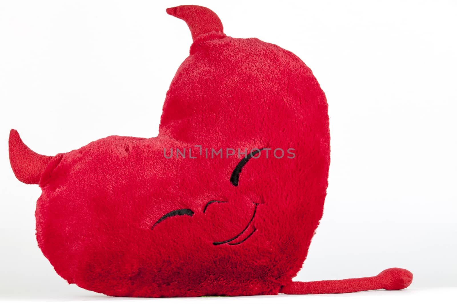 Satan red velvet pillows on a white background.