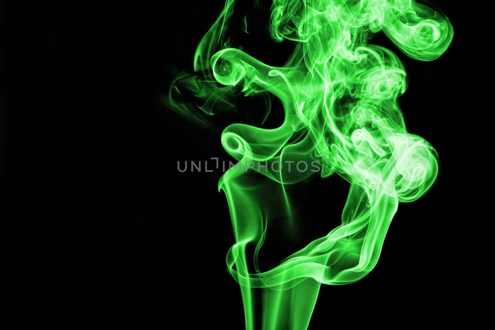 Green smoke with lights on black background