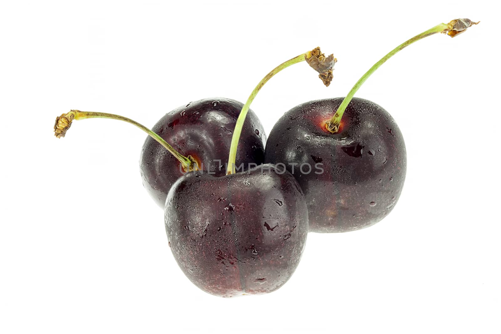 Three cherry berries isolated on white background cutout