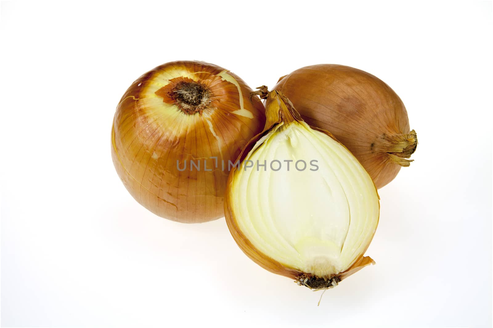 Fresh onion bulbs isolated on white background by Chattranusorn09