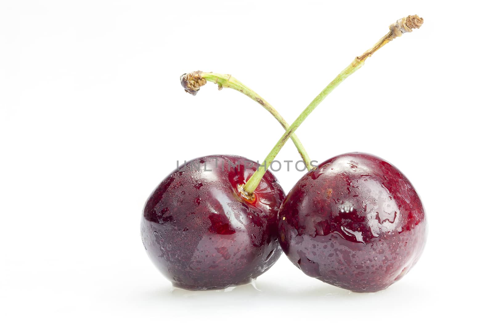 Two cherry berries isolated on white background cutout