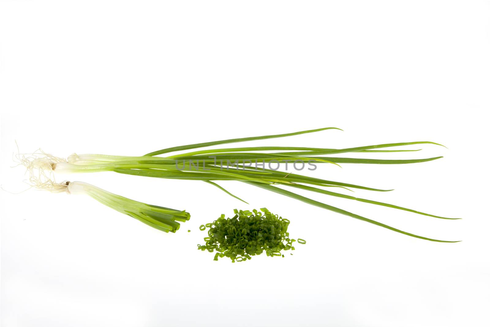 Fresh green chives isolated on white background