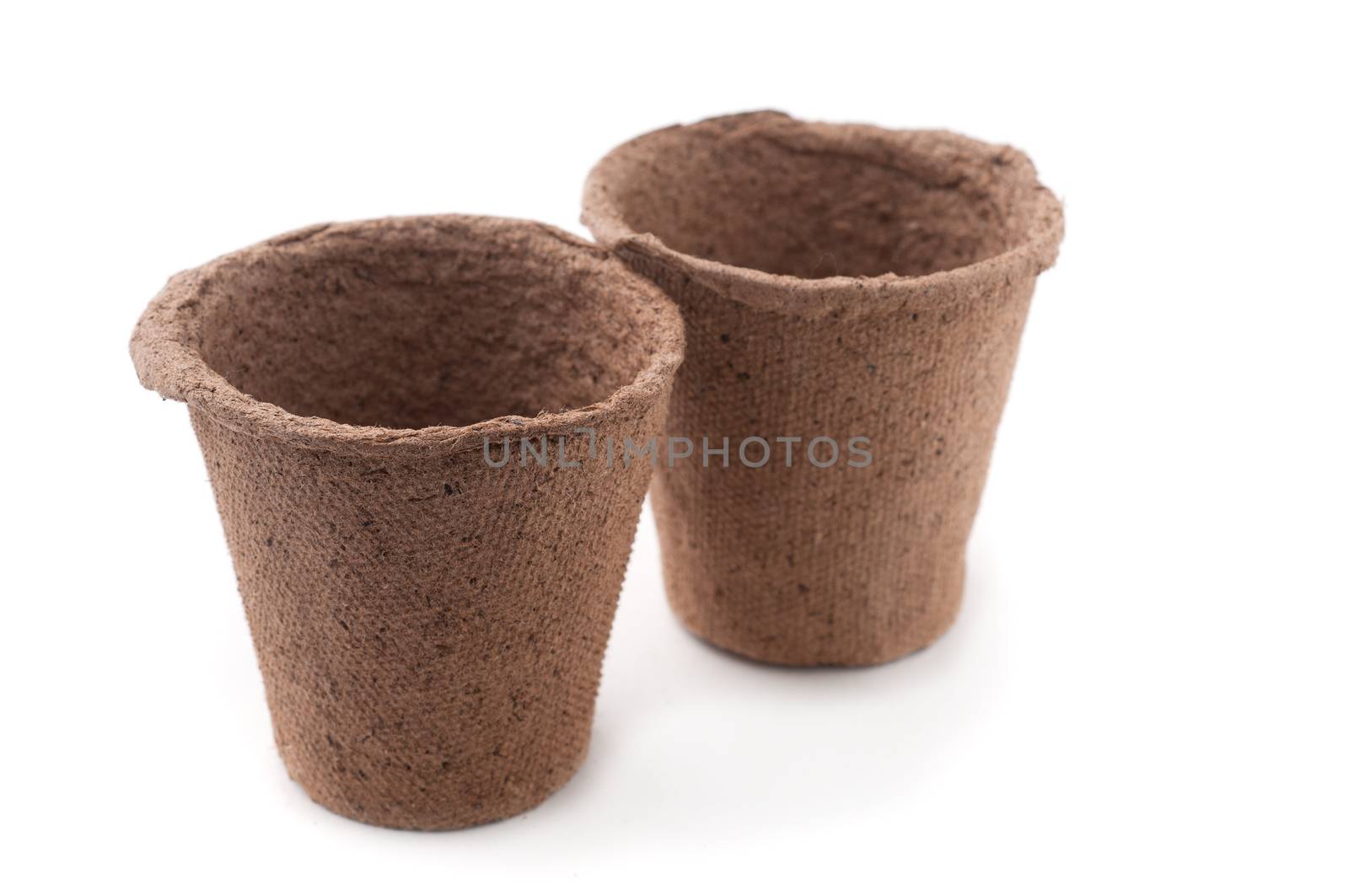 Two Peat Pots  Isolated On White Background