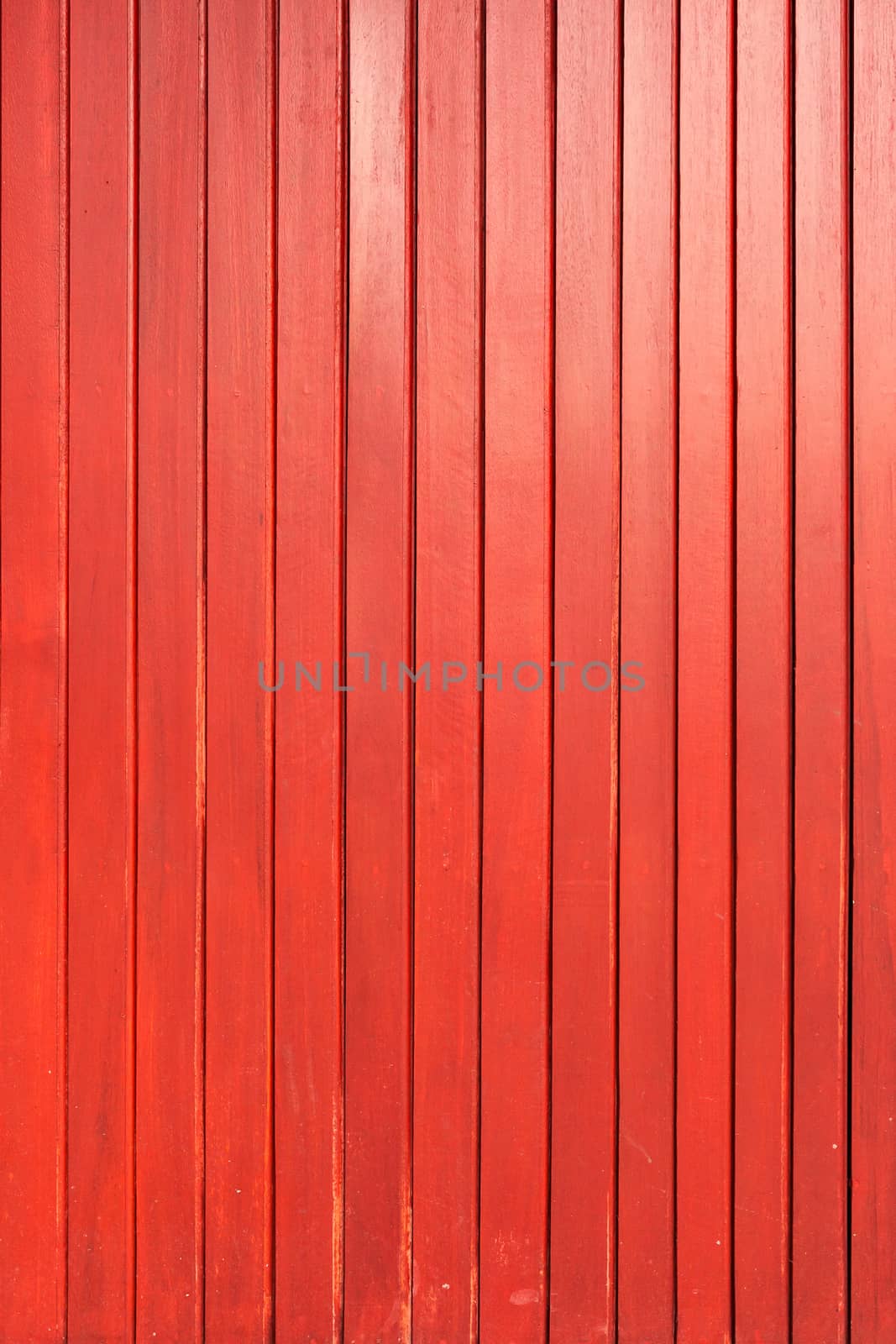 Red wood plank wall texture background.