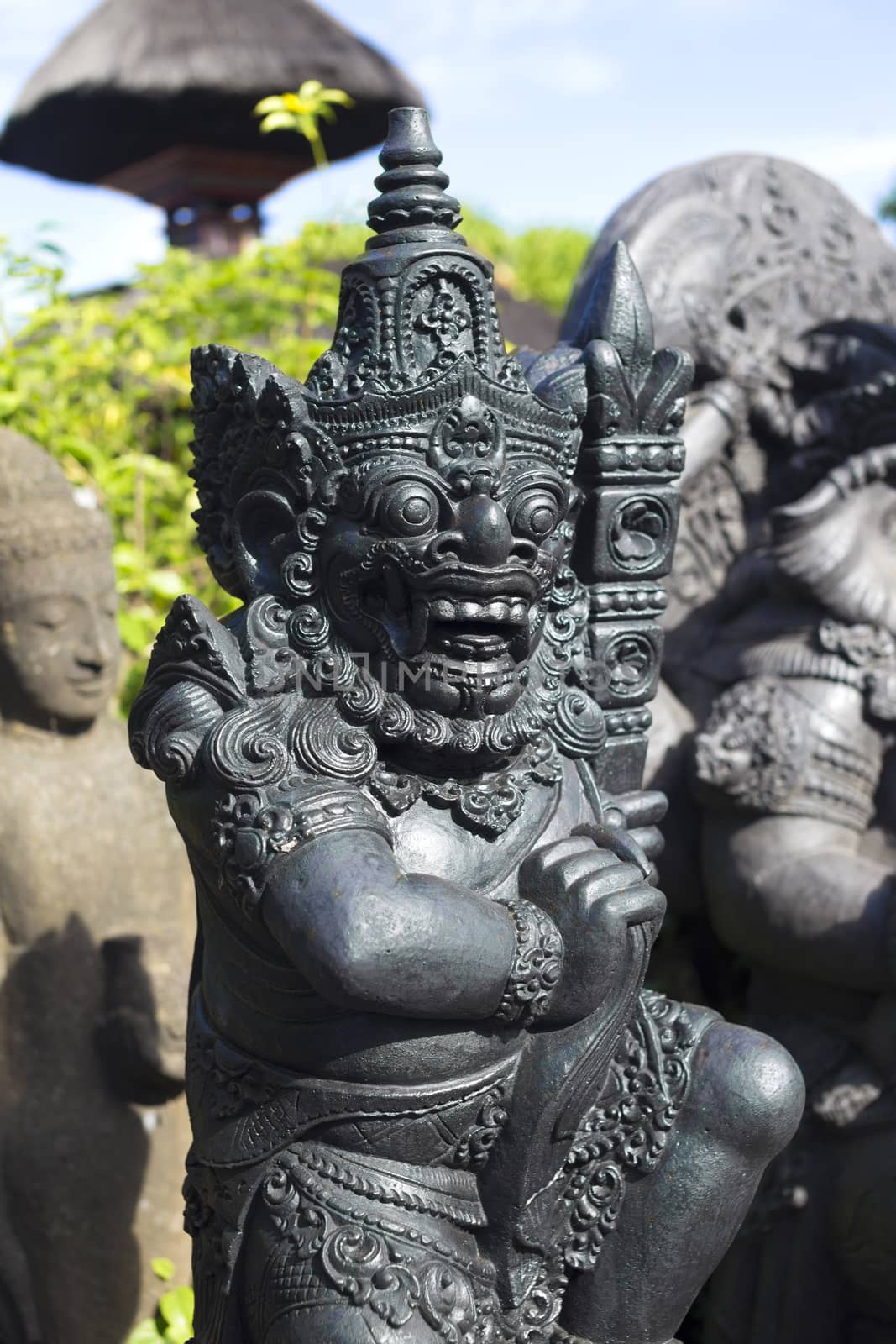 The old stone statue. Indonesia, Bali.
