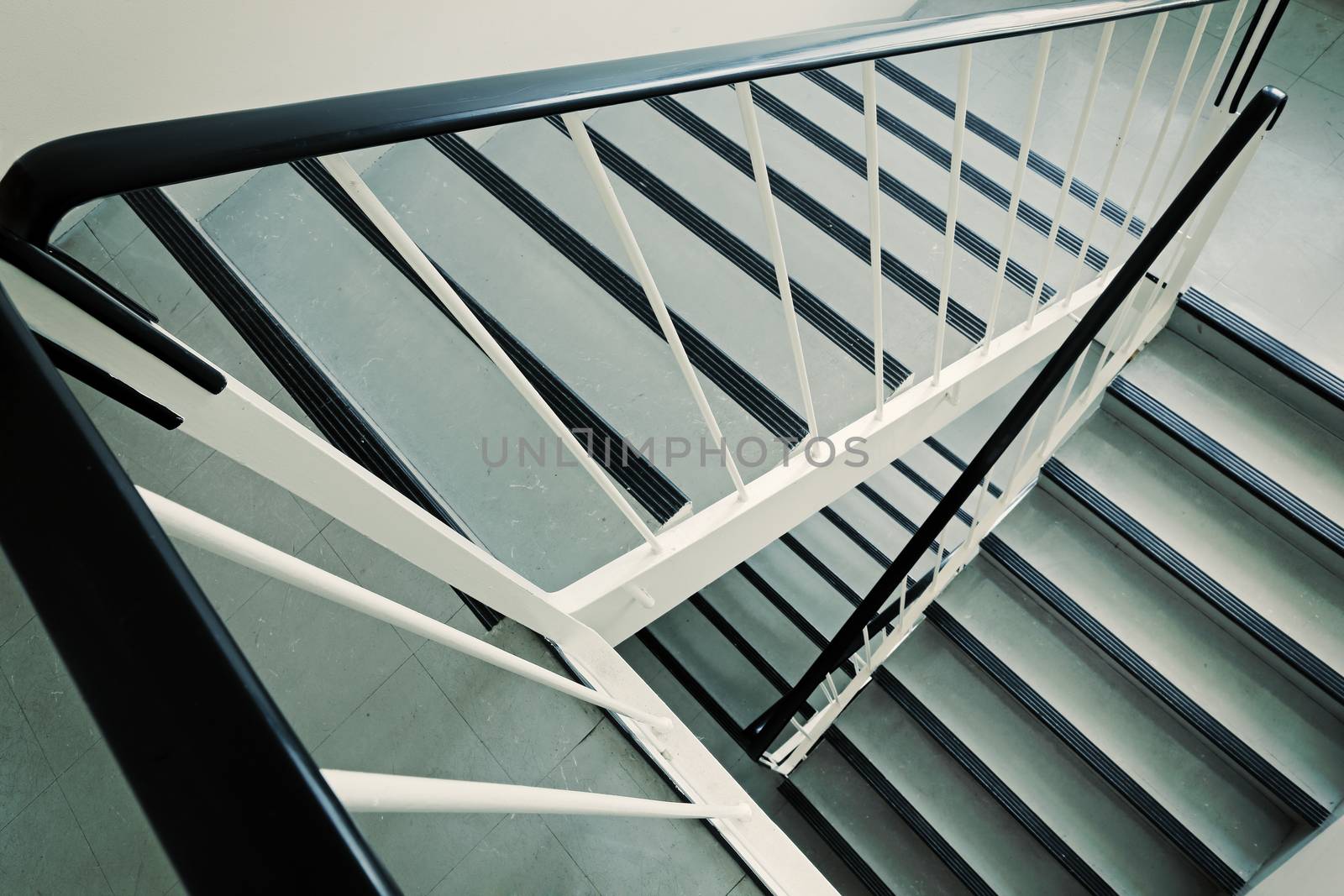 Old ugly and dirty staircase of a 1960s apartment building.