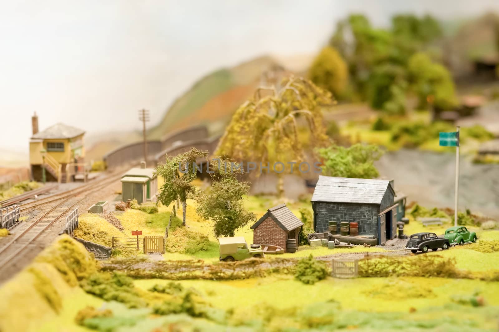 miniature model train set rural landscape and farm