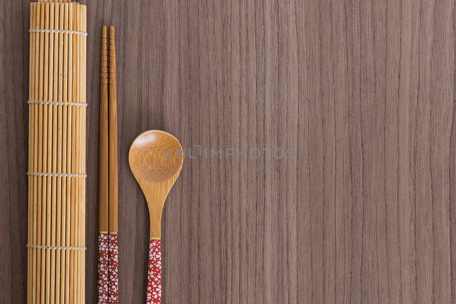 Pink decorated sushi bamboo chopsticks and spoon  