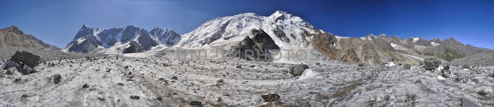 Scenic panorama of glacier and highest peaks in Tien-Shan mountain range in Kyrgyzstan