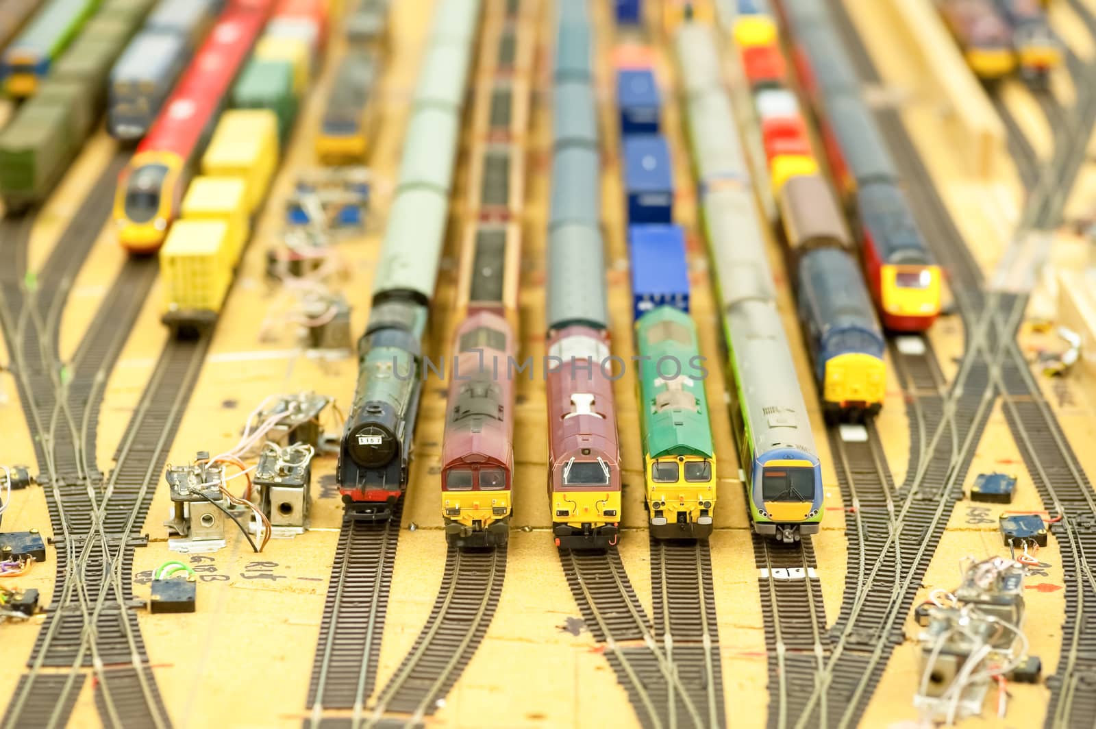 collection of model trains on a track layout