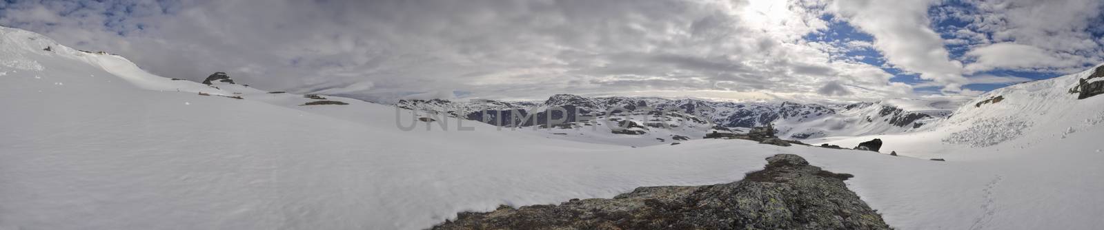 Scenic panorama of snowy landscape near Trolltunga in Norway