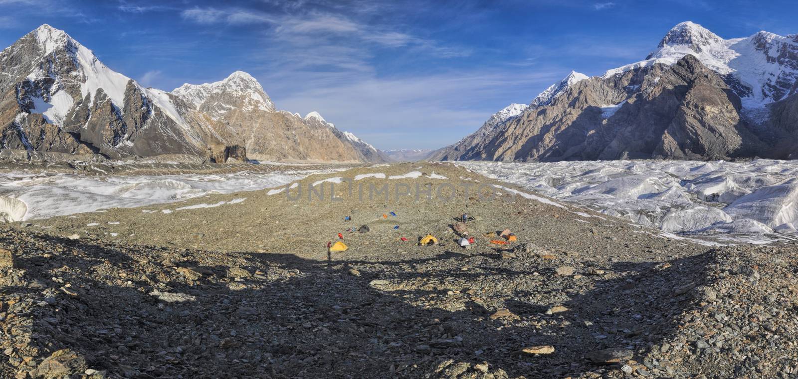 Scenic panorama of base camp on Engilchek glacier in picturesque Tian Shan mountain range in Kyrgyzstan
