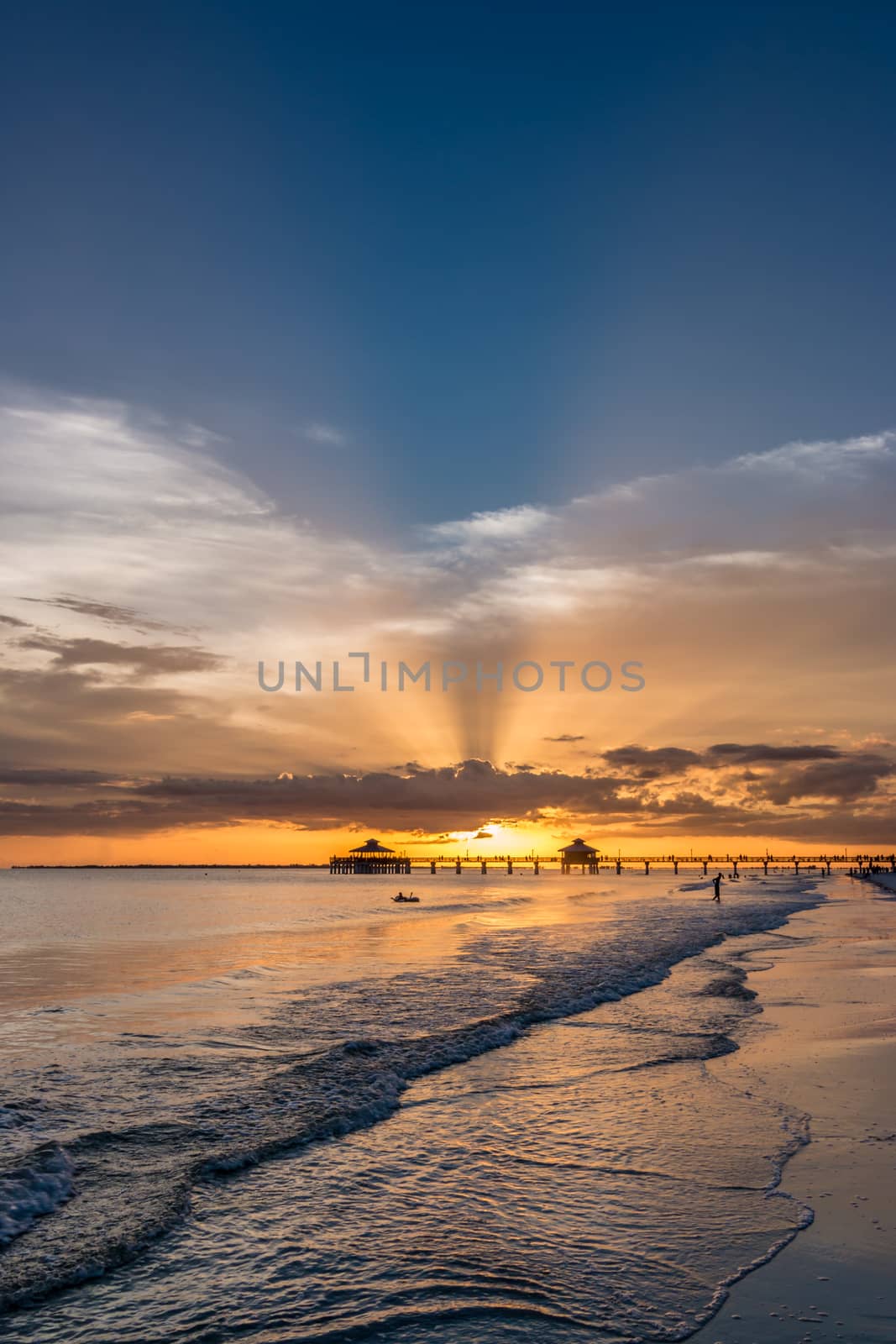 The beautiful sun setting on the shores of Fort Myers Beach located on Estero Island in Florida, United States of America