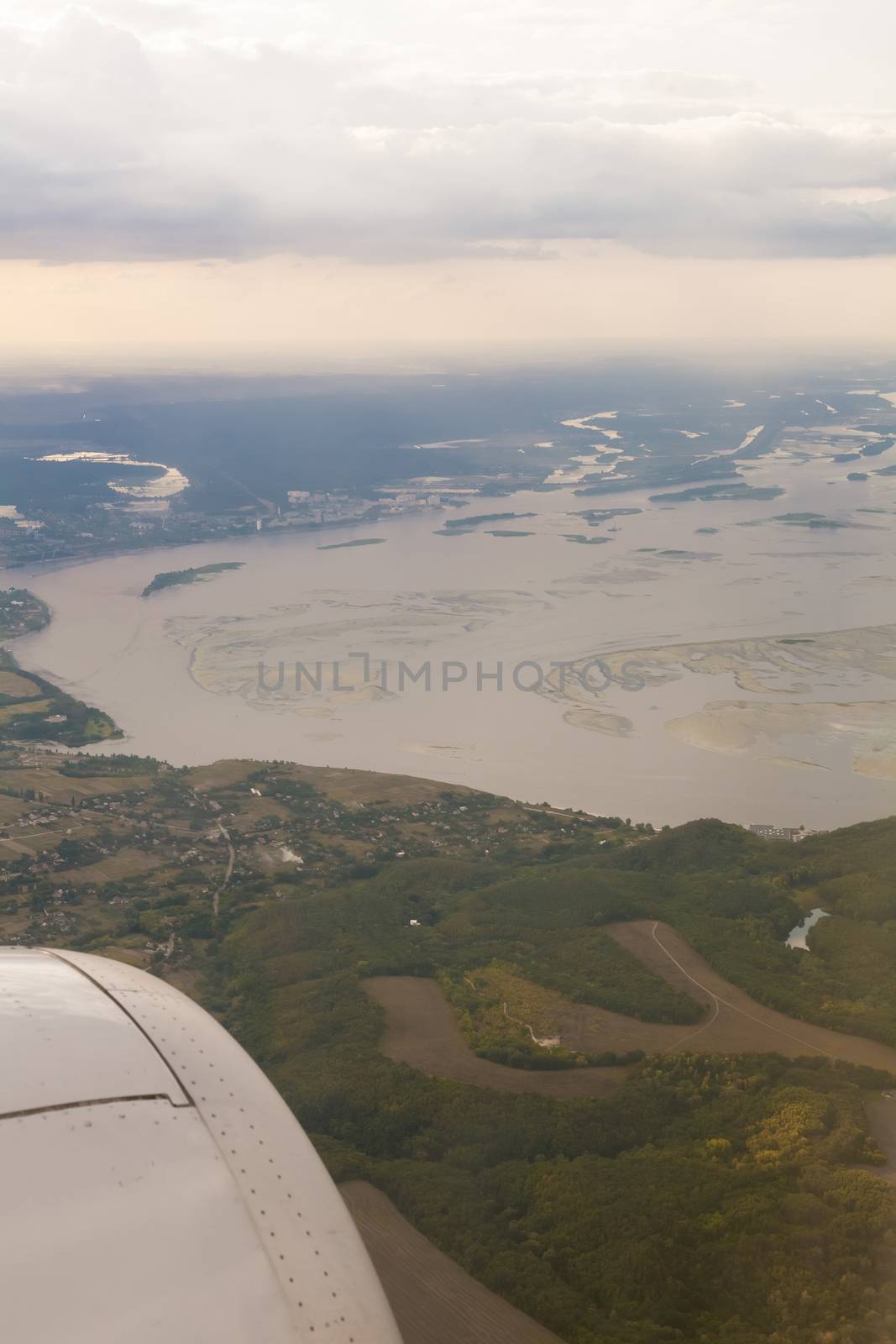 earth and plane wing view by sarymsakov