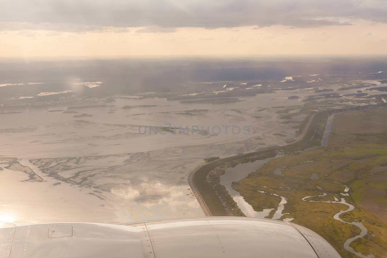 earth and plane wing view by sarymsakov