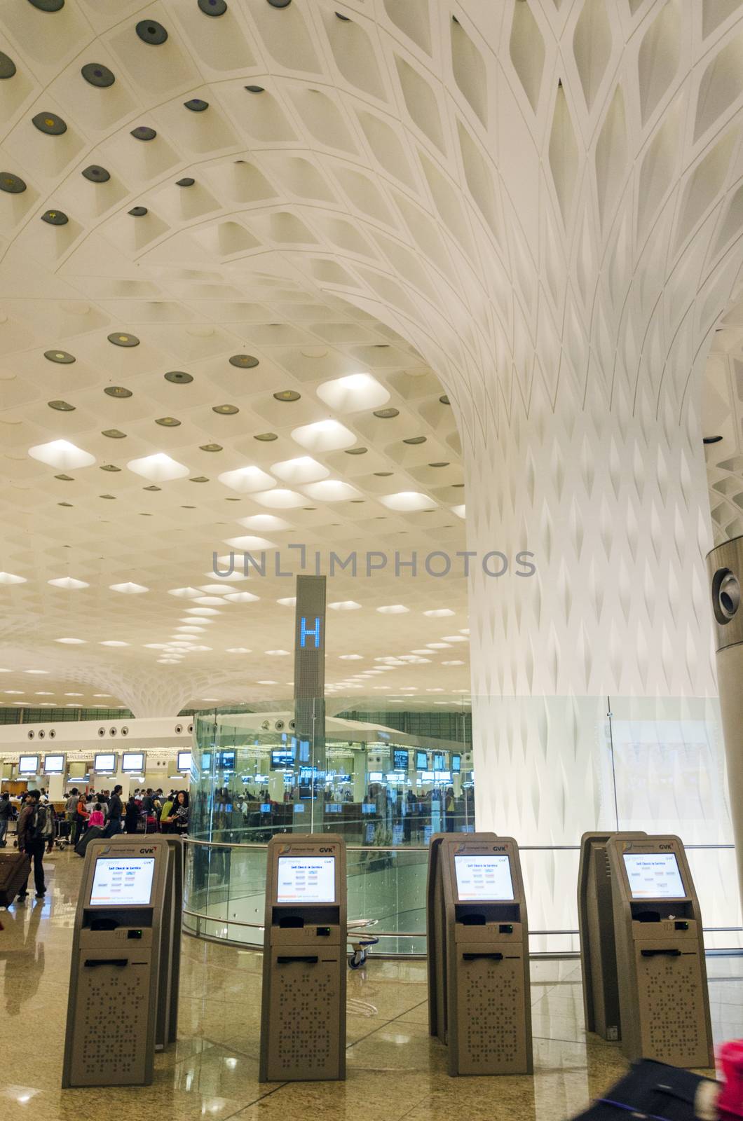 Mumbai, India - January 5, 2015: Crowd at visit Chhatrapati Shivaji International Airport. by siraanamwong