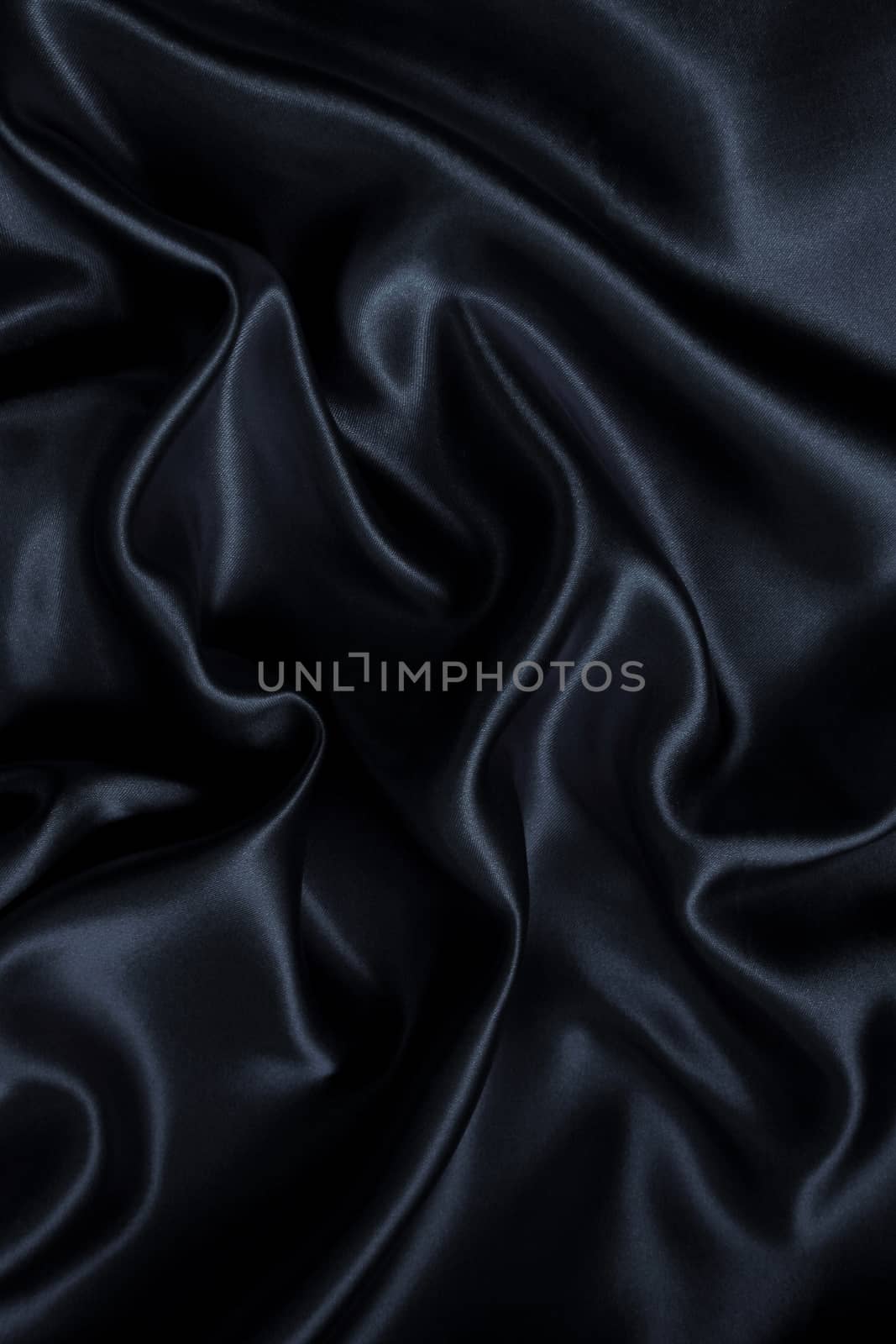 Smooth elegant black silk can use as background 