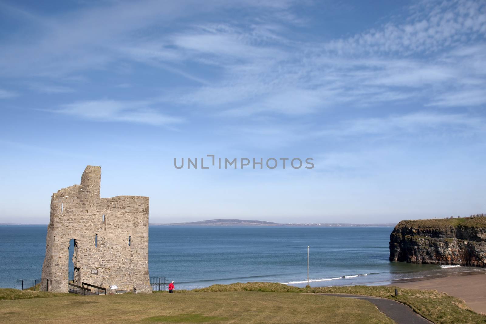 a beautiful path with tourist walking to Ballybunion beach and castle