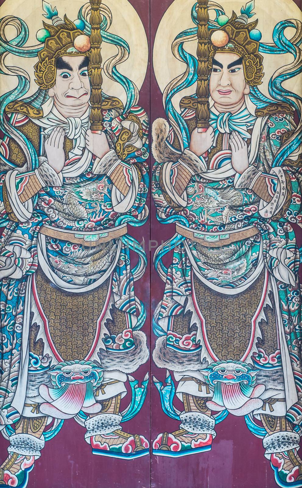 Painting of soldiers at the doors of Chinese temple