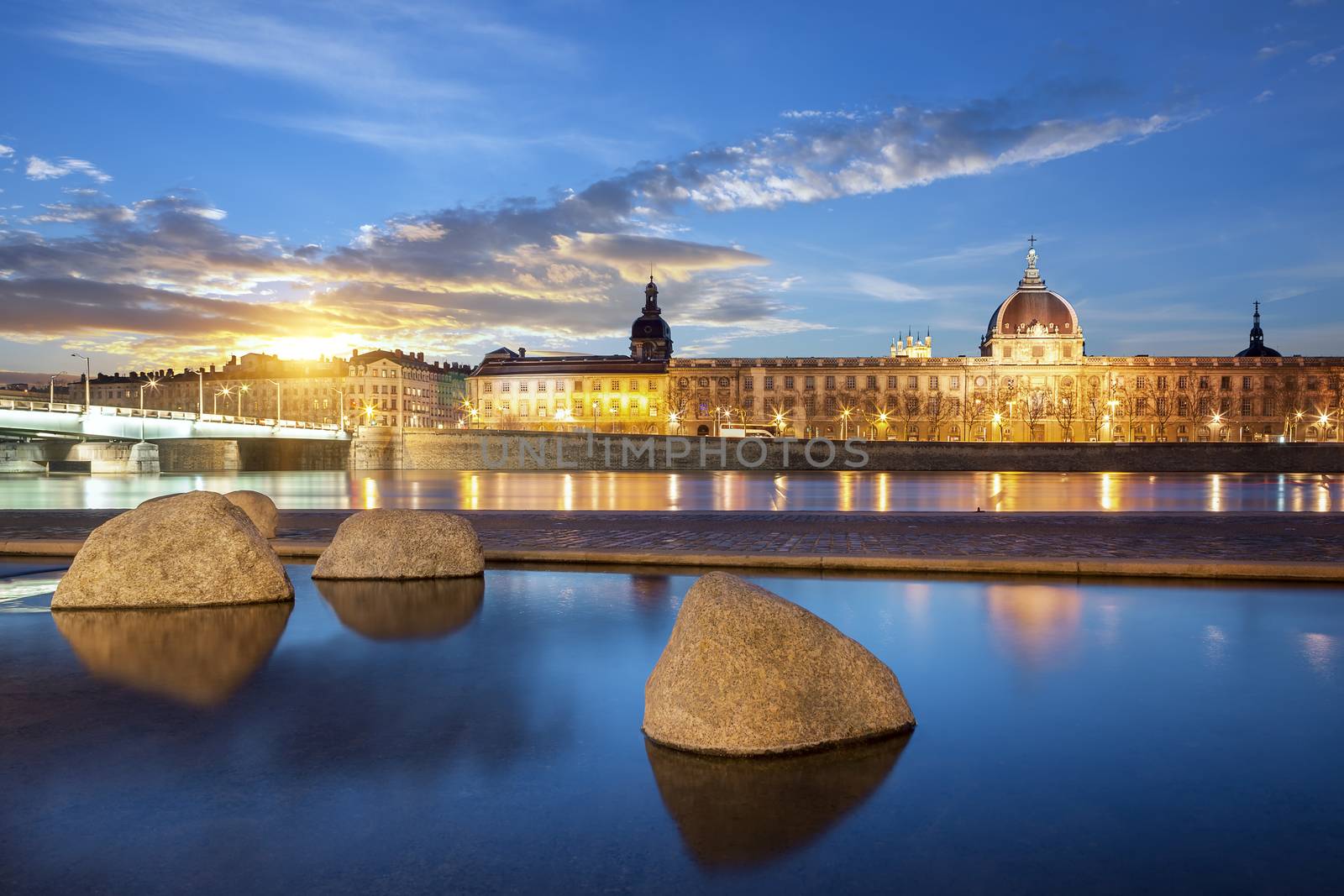 View from Rhone river in Lyon city at sunset, France.