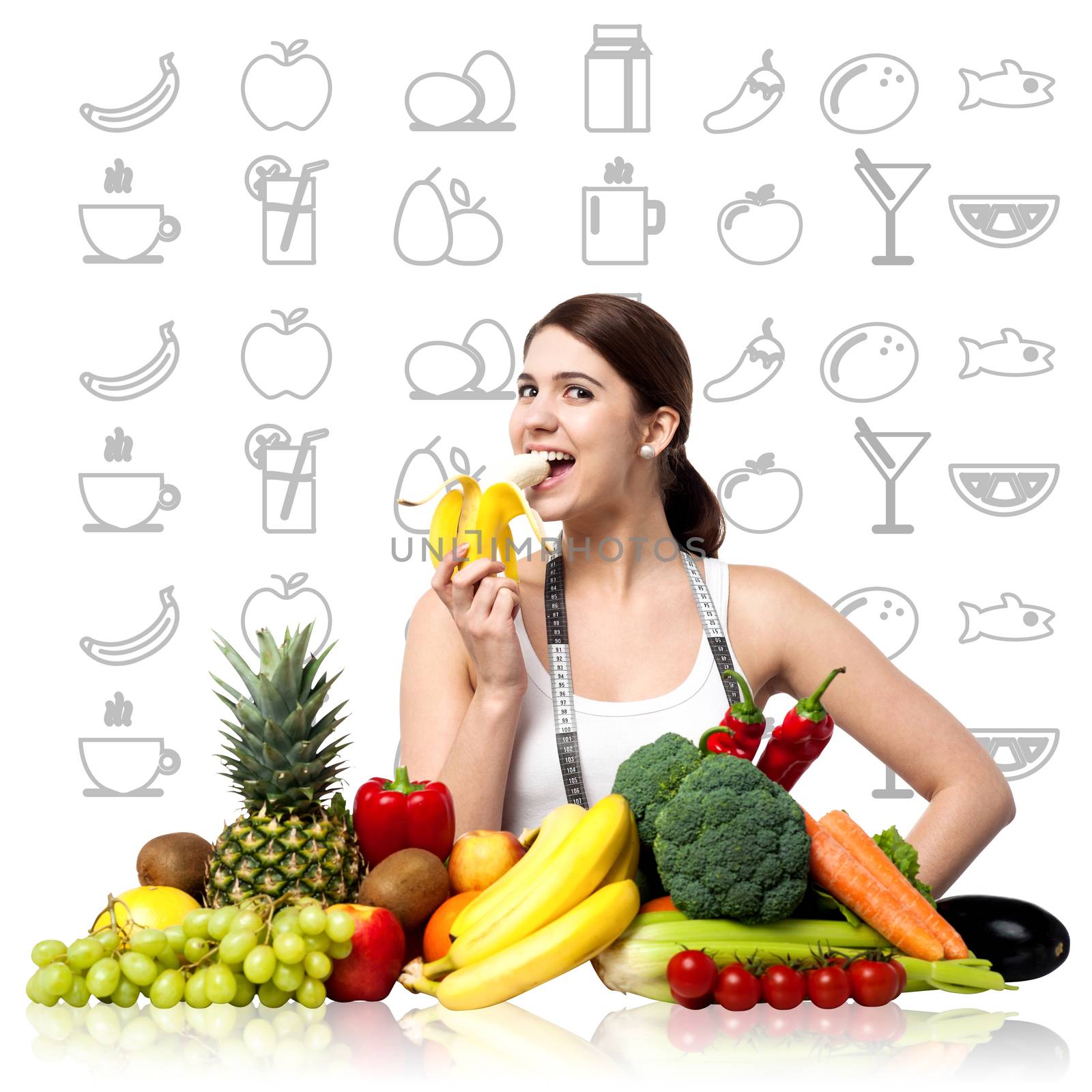 Fit smiling woman enjoying banana by stockyimages