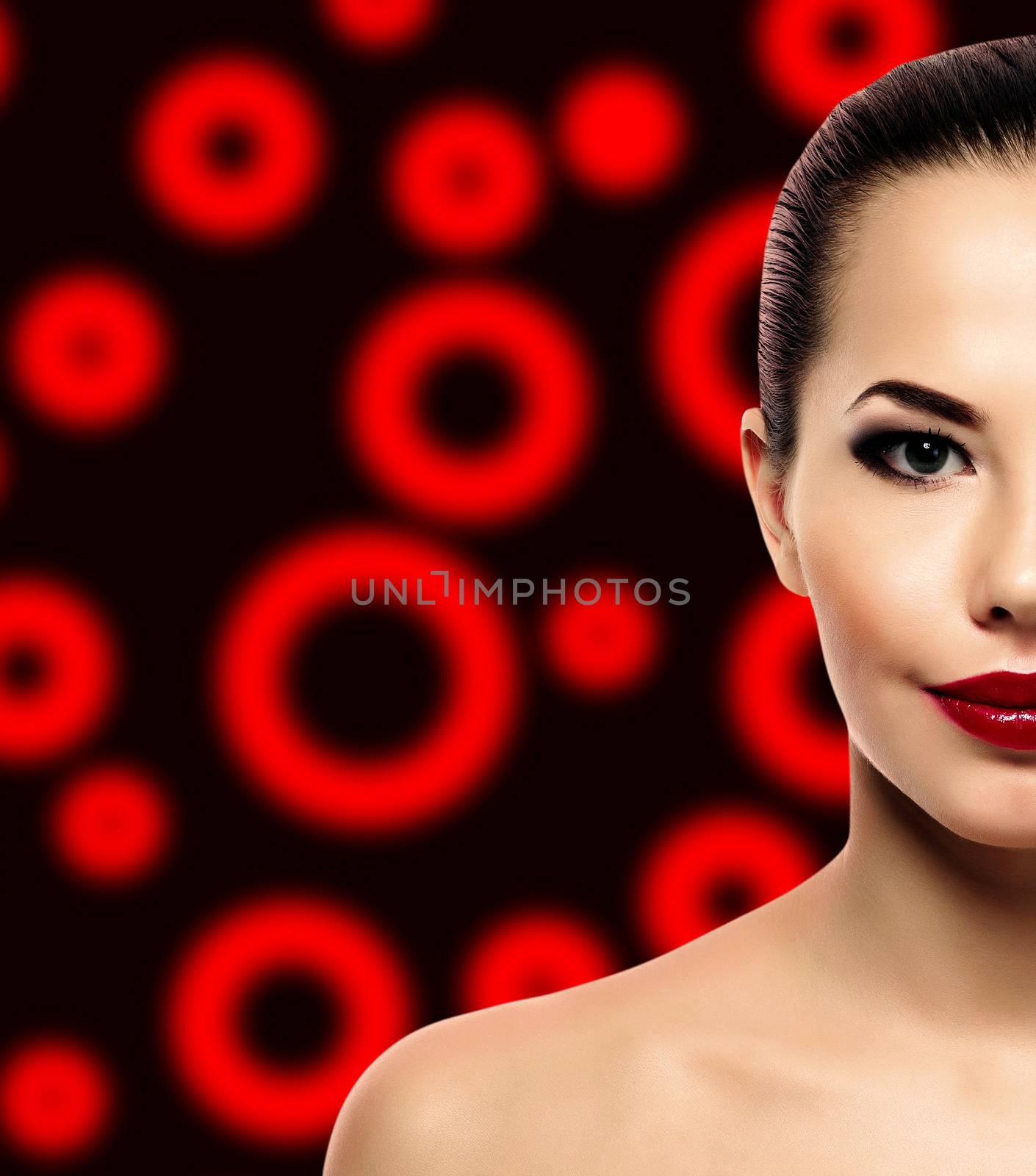 Pretty girl posing on an abstract background by Nobilior