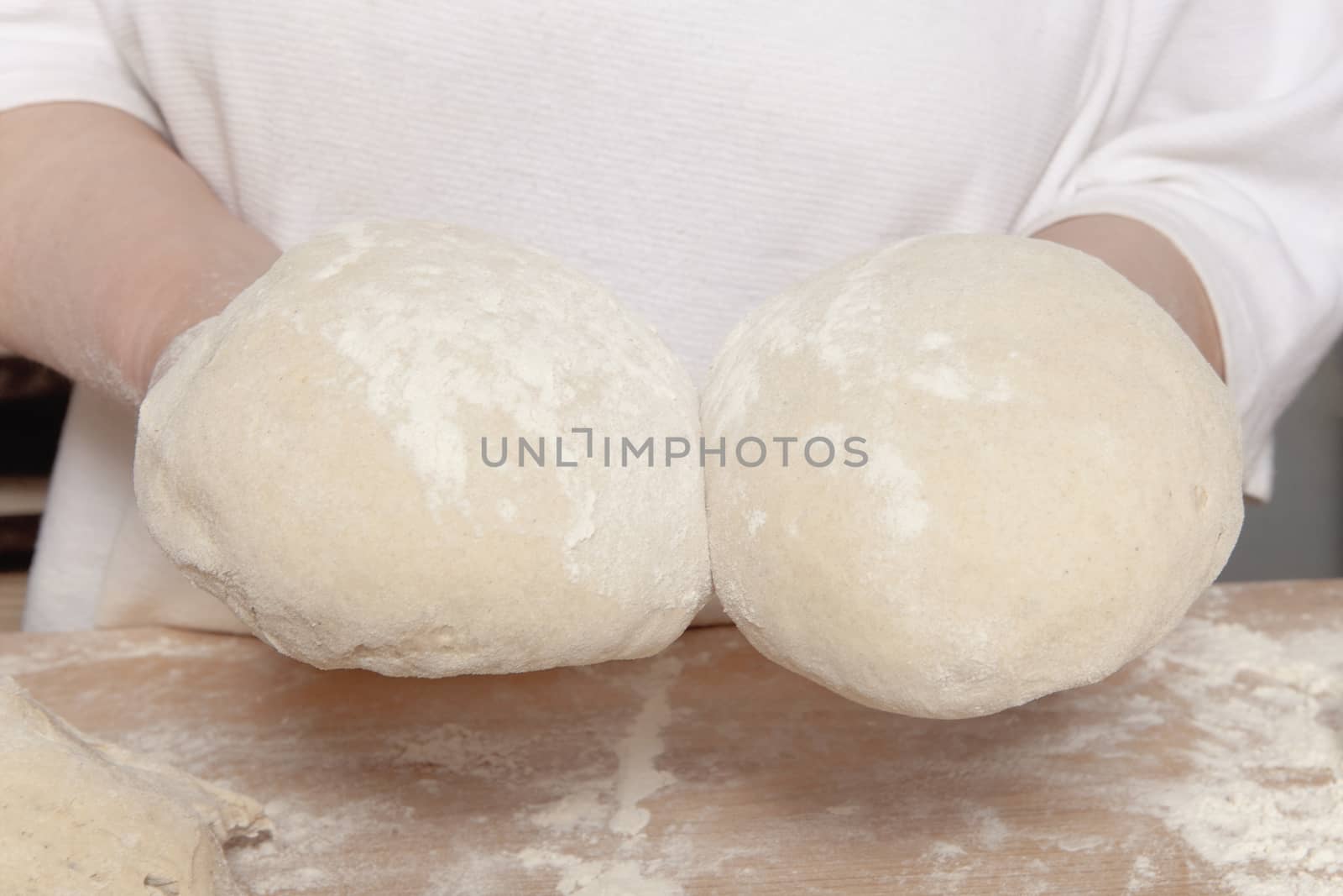 Two Loafs of Bread Ready for Baking by courtyardpix