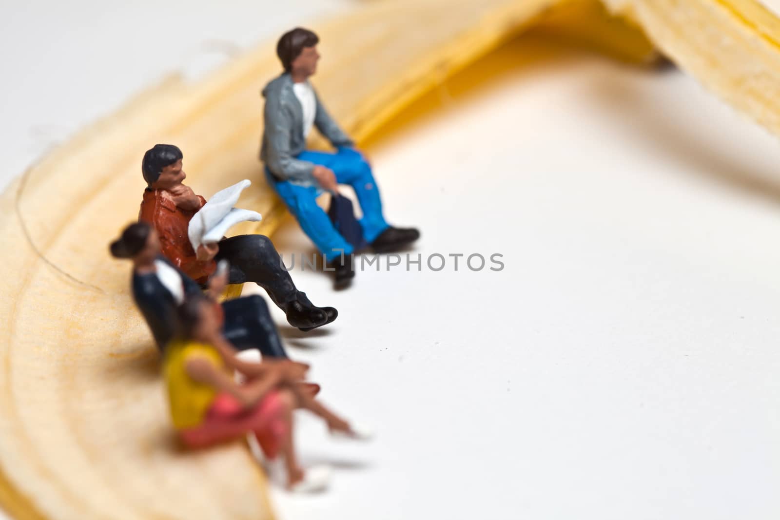Miniature people in action in various situations