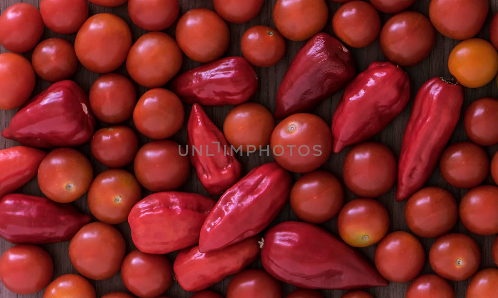 Frame full of red tomatoes and chili 